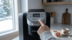 Close-up illustration of the Keurig K-Duo coffee maker using a K-Cup pod for a quick morning commute in Toronto.