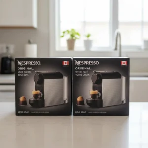 An illustration of Nespresso machine packaging featuring English and French text, showcasing its availability in the Canadian retail market.