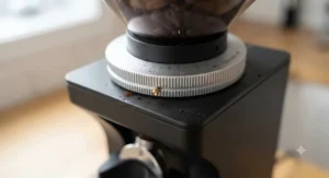 Detailed view of a stepless adjustment ring on a high-end espresso grinder for precise dial-in.