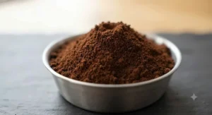 Macro shot of a fine, powdery grind texture produced by a specialized espresso grinder.